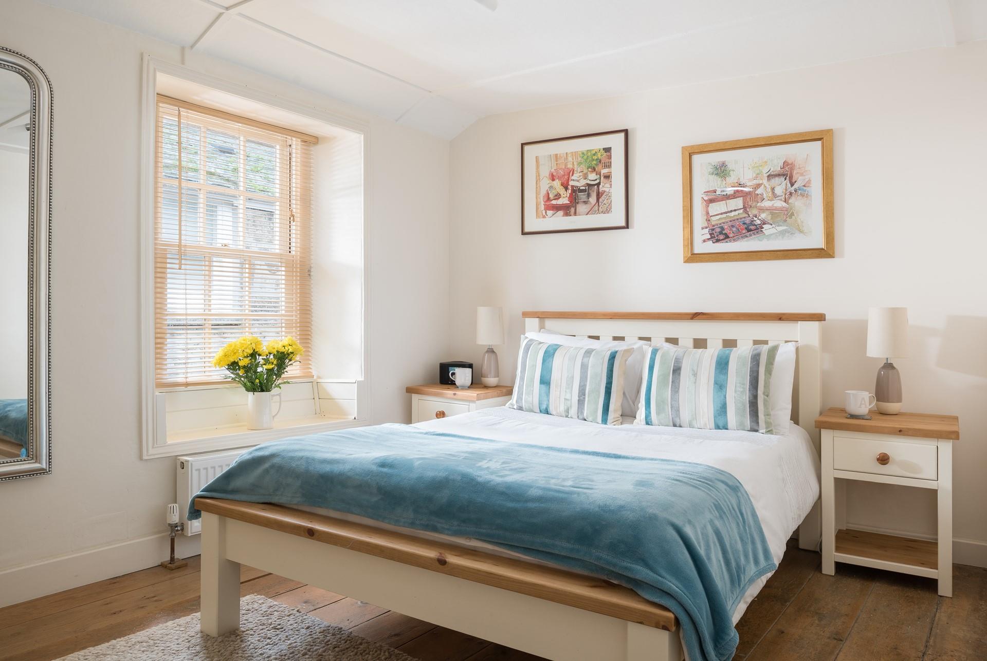 This cosy bedroom will offer you a relaxing night's sleep.