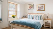This cosy bedroom will offer you a relaxing night's sleep.