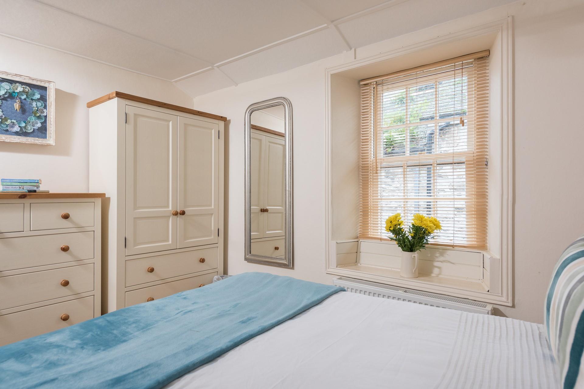 Bedroom 2 has furniture ideal for unpacking your beach clothes when you arrive.