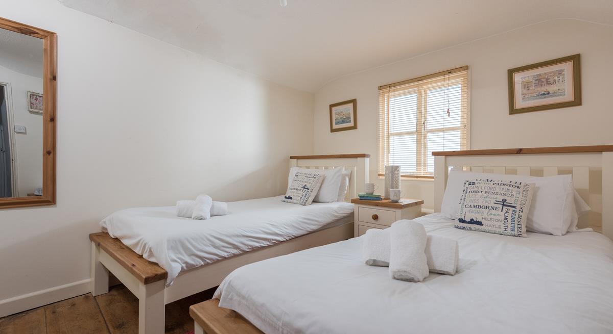 Enjoy a lazy morning in the twin beds. 