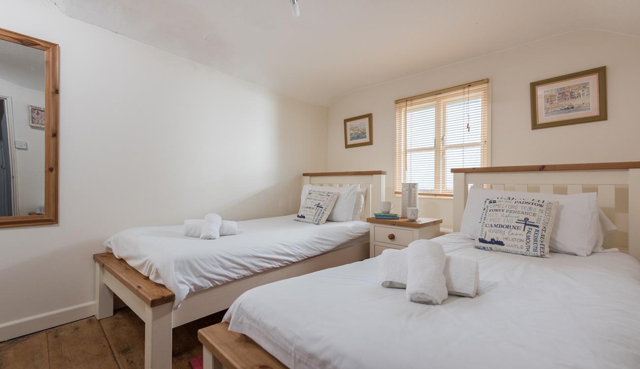 Enjoy a lazy morning in the twin beds. 