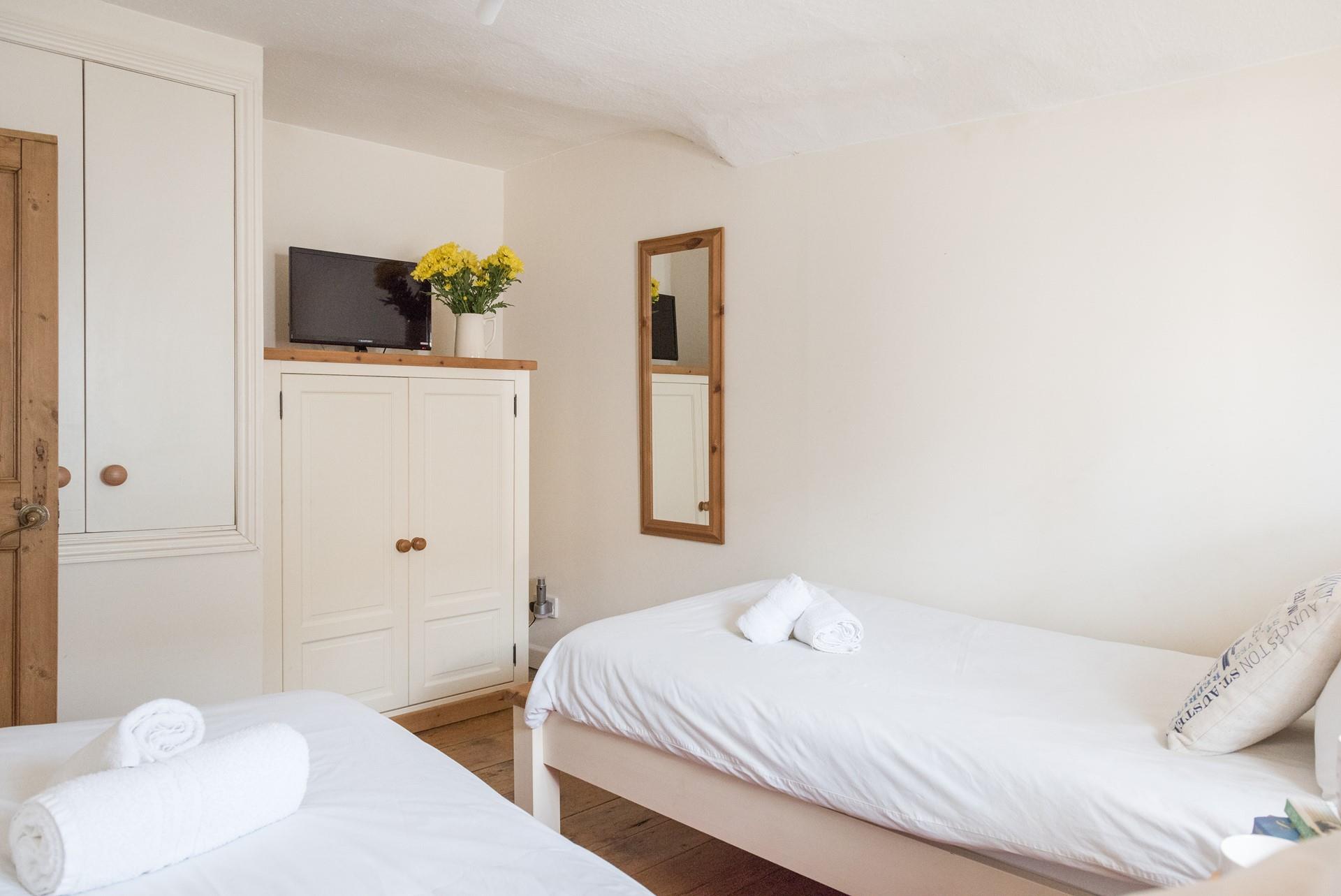 Watch some TV before drifting off to sleep.