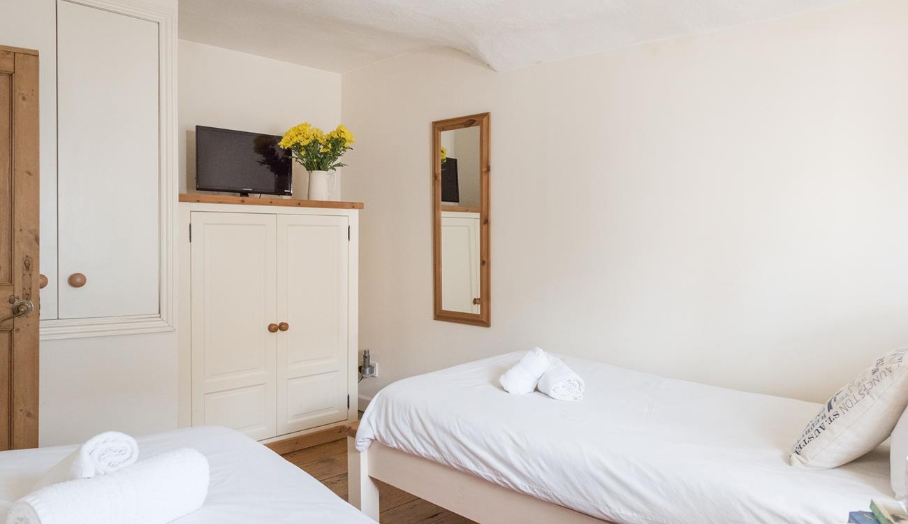 Watch some TV before drifting off to sleep.