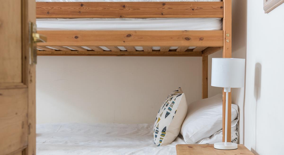 Settle the kids to sleep, they'll be exhausted after a day on the beach.