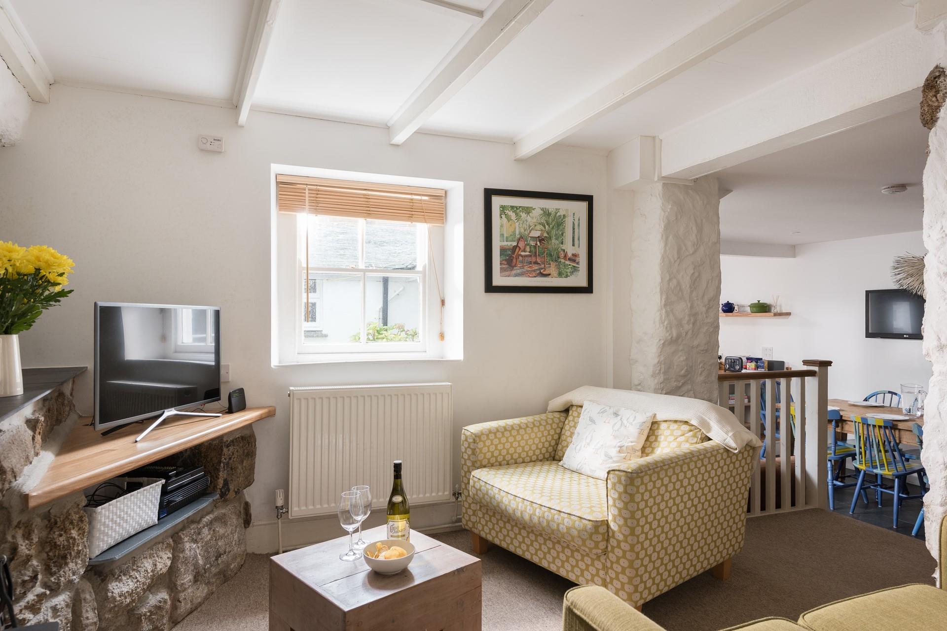 Enjoy wine and nibbles in the evening with a good film on the TV.