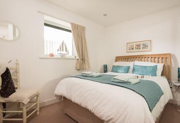 Bedroom 1 is bright and airy, yet still manages to provide a snug atmosphere.