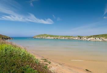 Spend your days relaxing on the sands of Porth beach, soaking up the sun.
