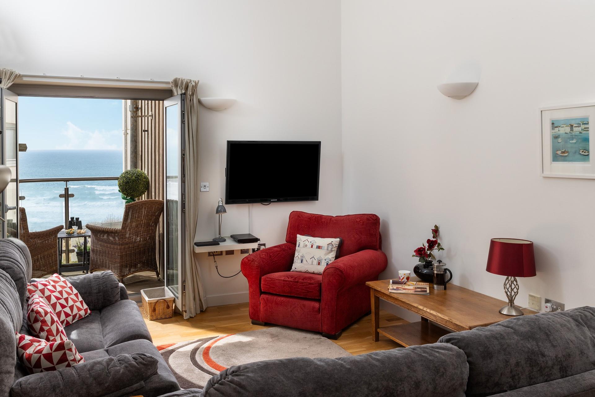 With two sofas and an armchair, there is ample seating for the whole family!