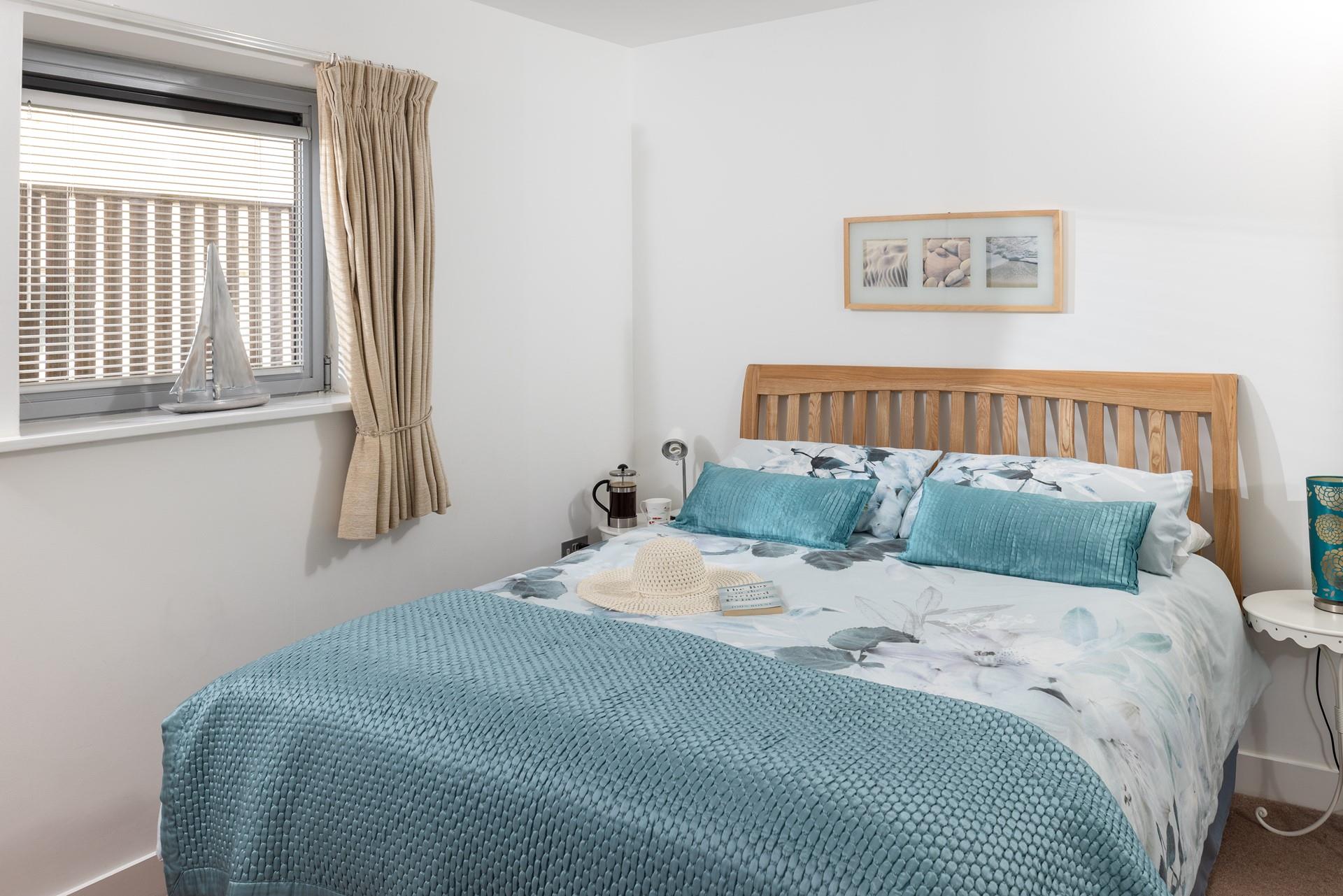 Bedroom 1 is bright and airy, yet still manages to provide a snug atmosphere.