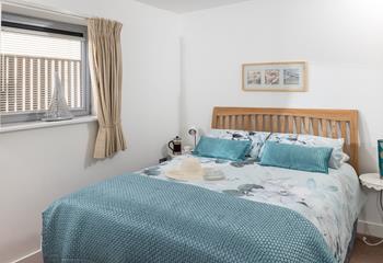 Bedroom 1 is bright and airy, yet still manages to provide a snug atmosphere.