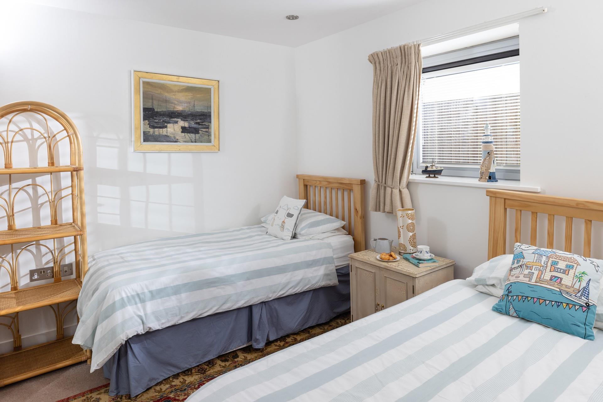 Comfortable twin beds in bedroom 2 will ensure the children enjoy a good night's sleep ahead of the next day of adventures. 