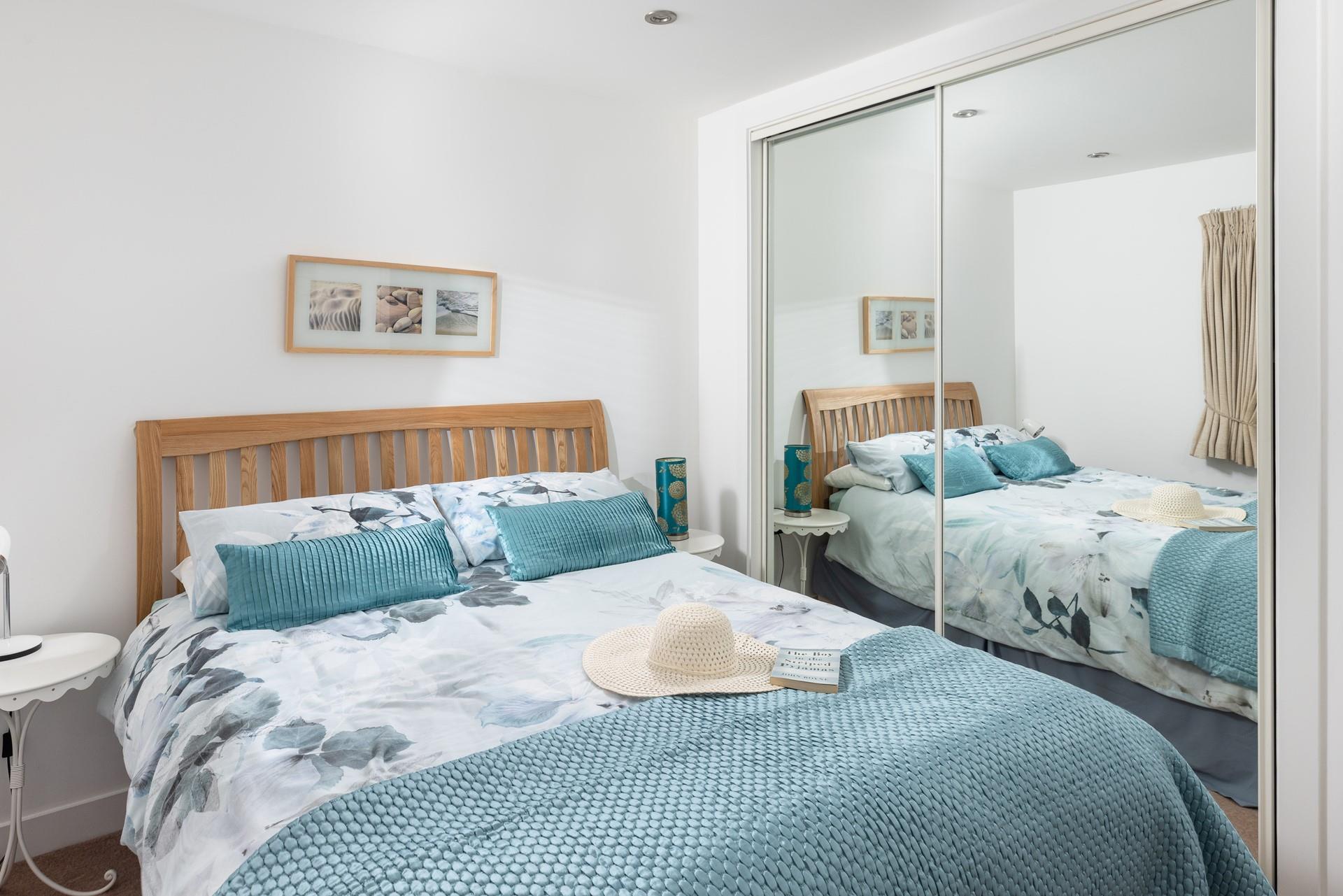 Coastal blues create a lovely, calming sanctuary.