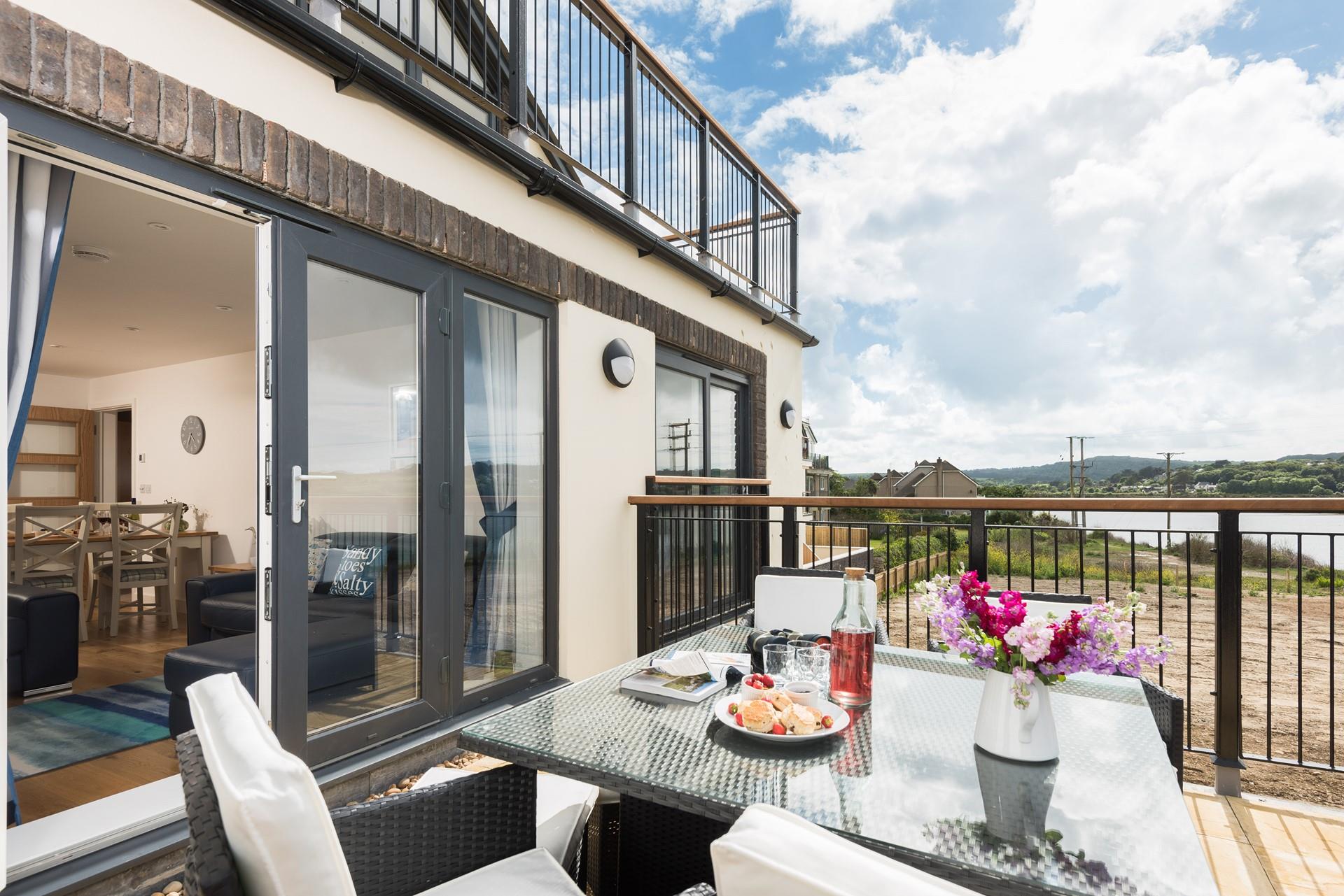 Located in a peaceful setting, the balcony offers the perfect spot to enjoy a brew with a view.