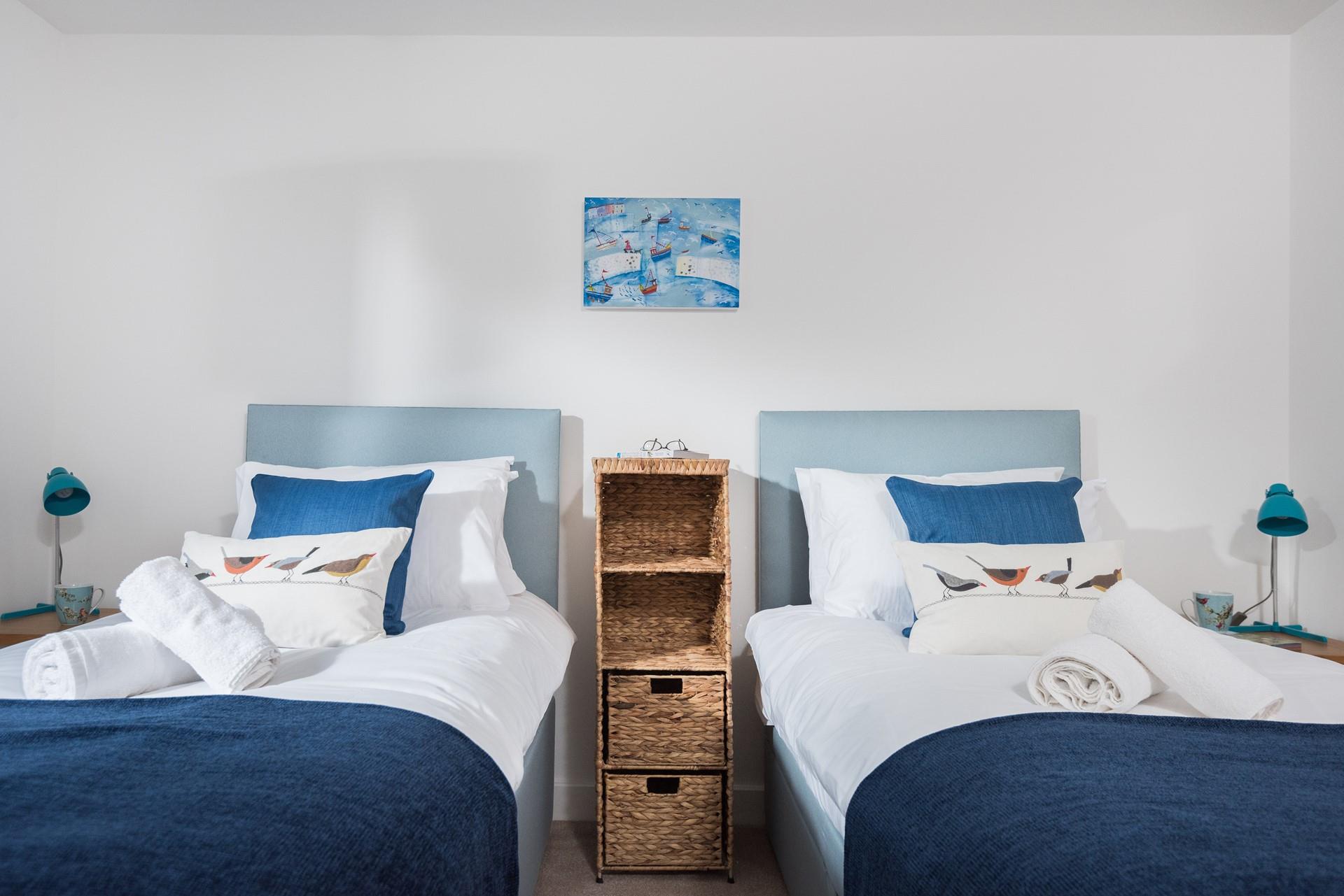 Comfortable and inviting, the sumptuous single beds promise a restorative night's sleep. 