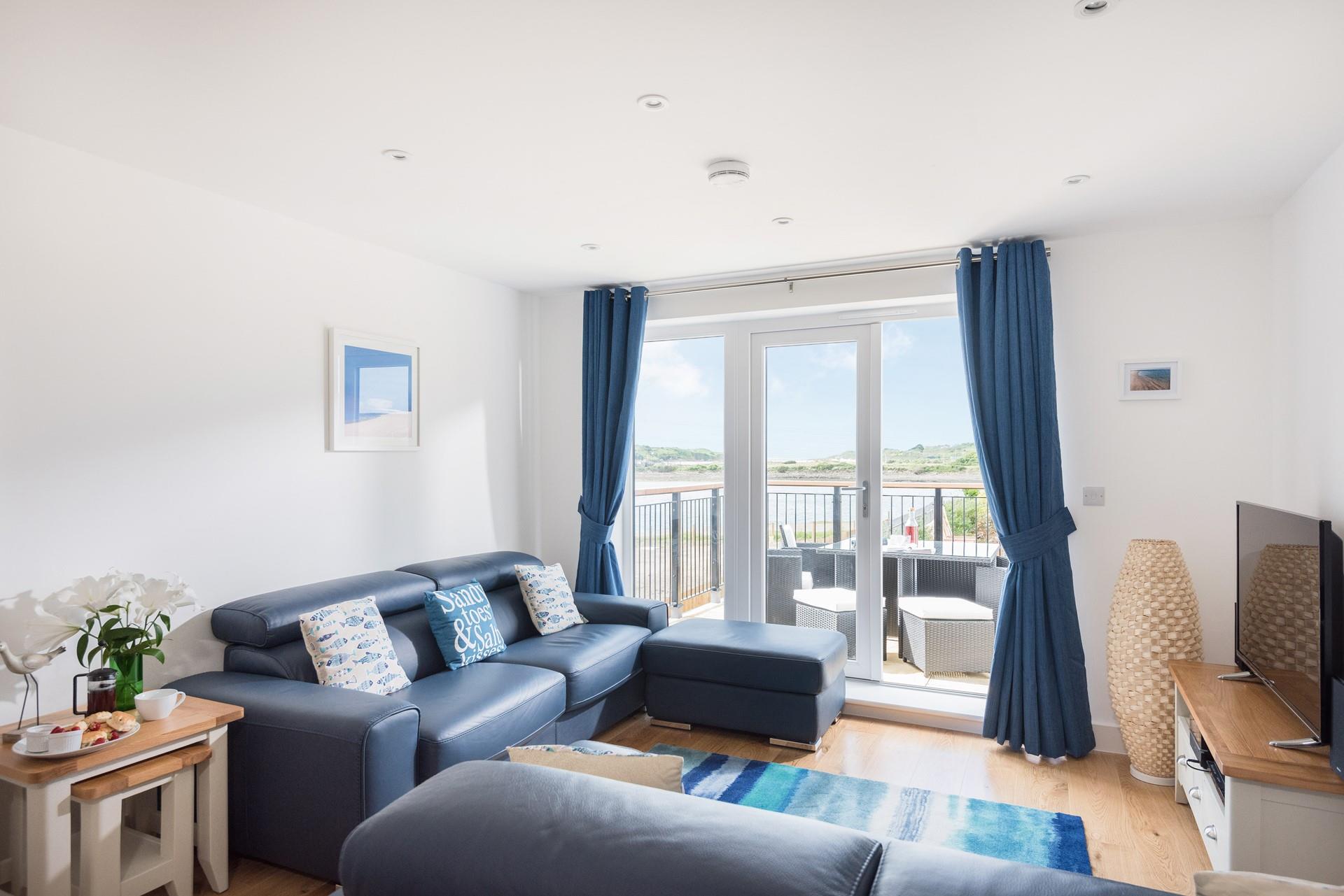 Tones of blue mirror the Cornish sea view. 