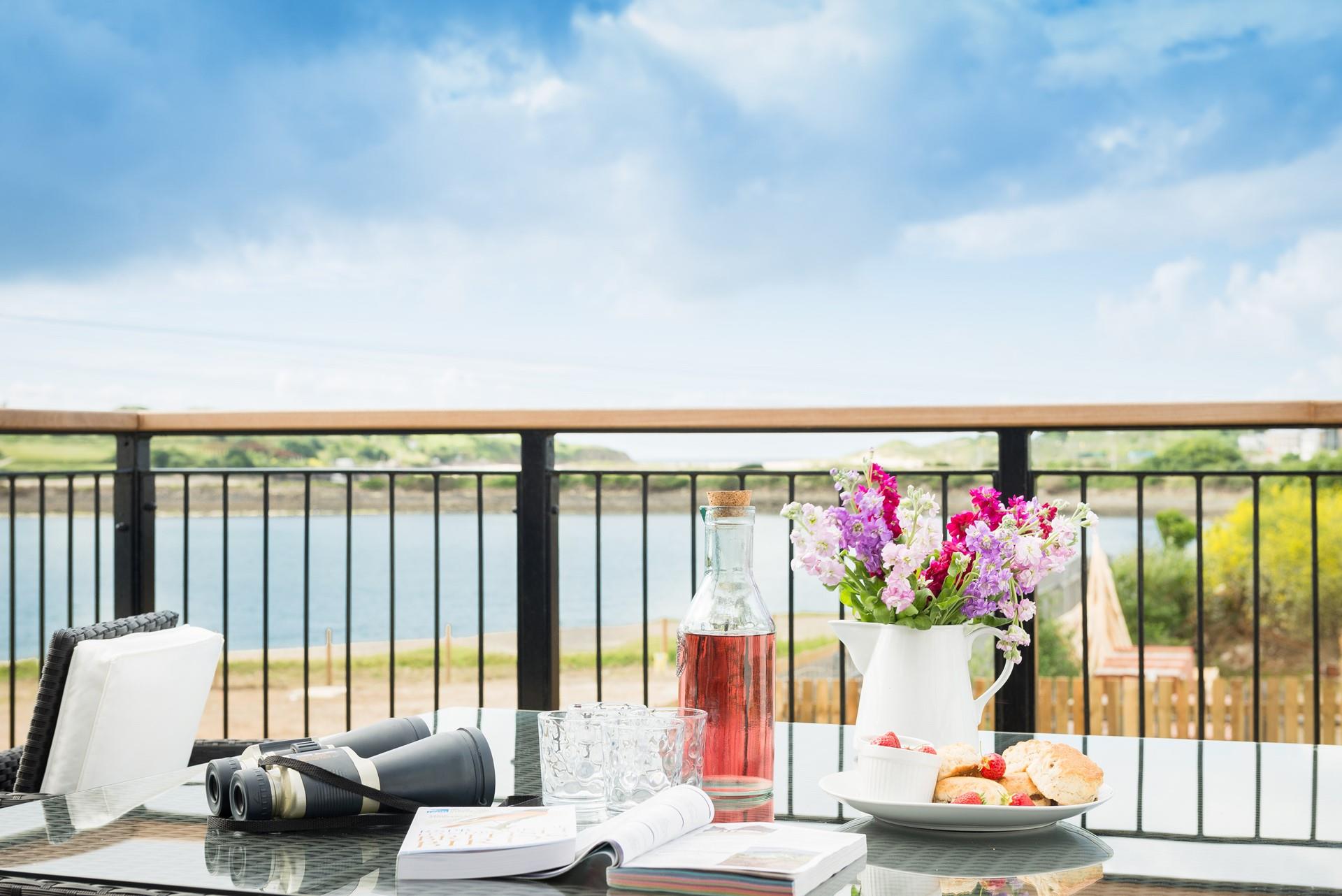 Sit out in the sun and indulge in a Cornish Cream Tea.