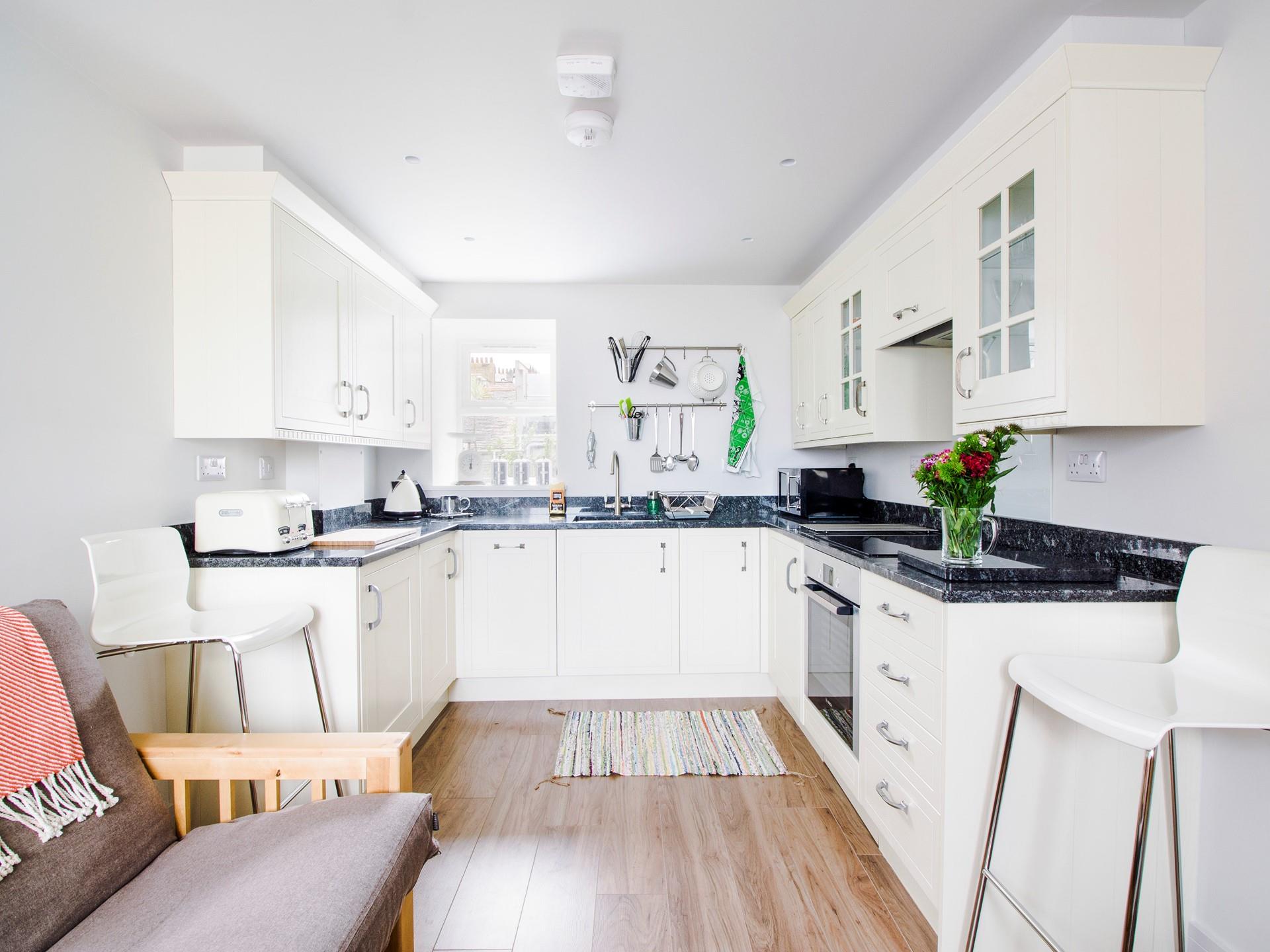 Beautifully presented open plan kitchen.