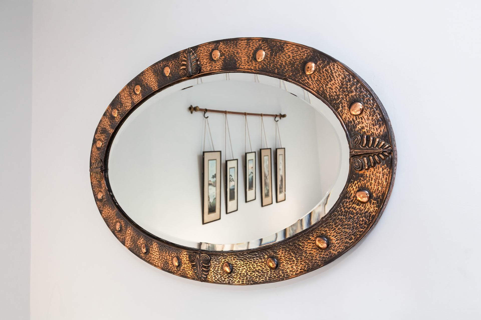 One-off pieces such as this gorgeous mirror fill this apartment with character.