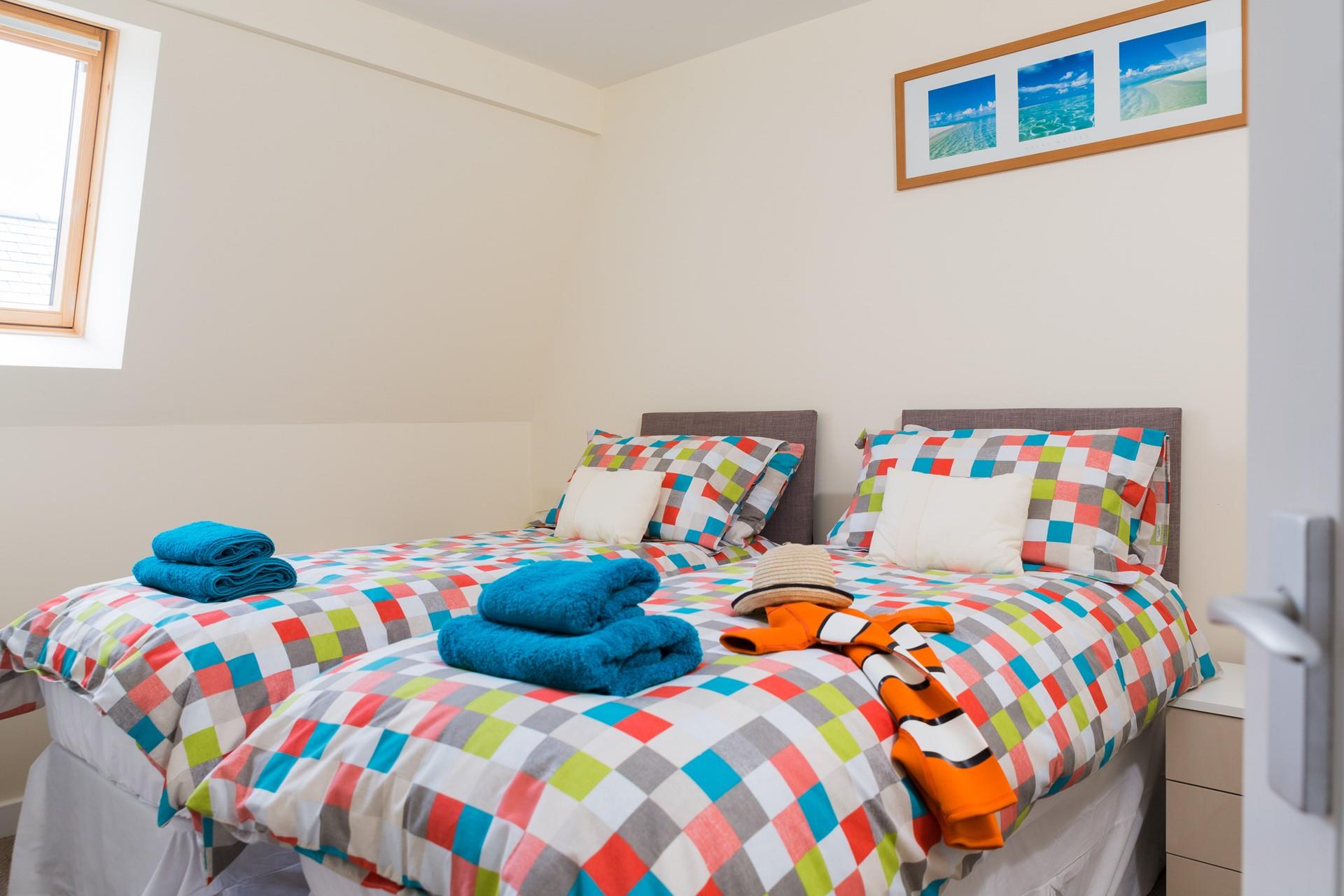 Bedroom 2 has the benefit of zip and link beds for flexible sleeping arrangements. Choose from twin beds or king size.