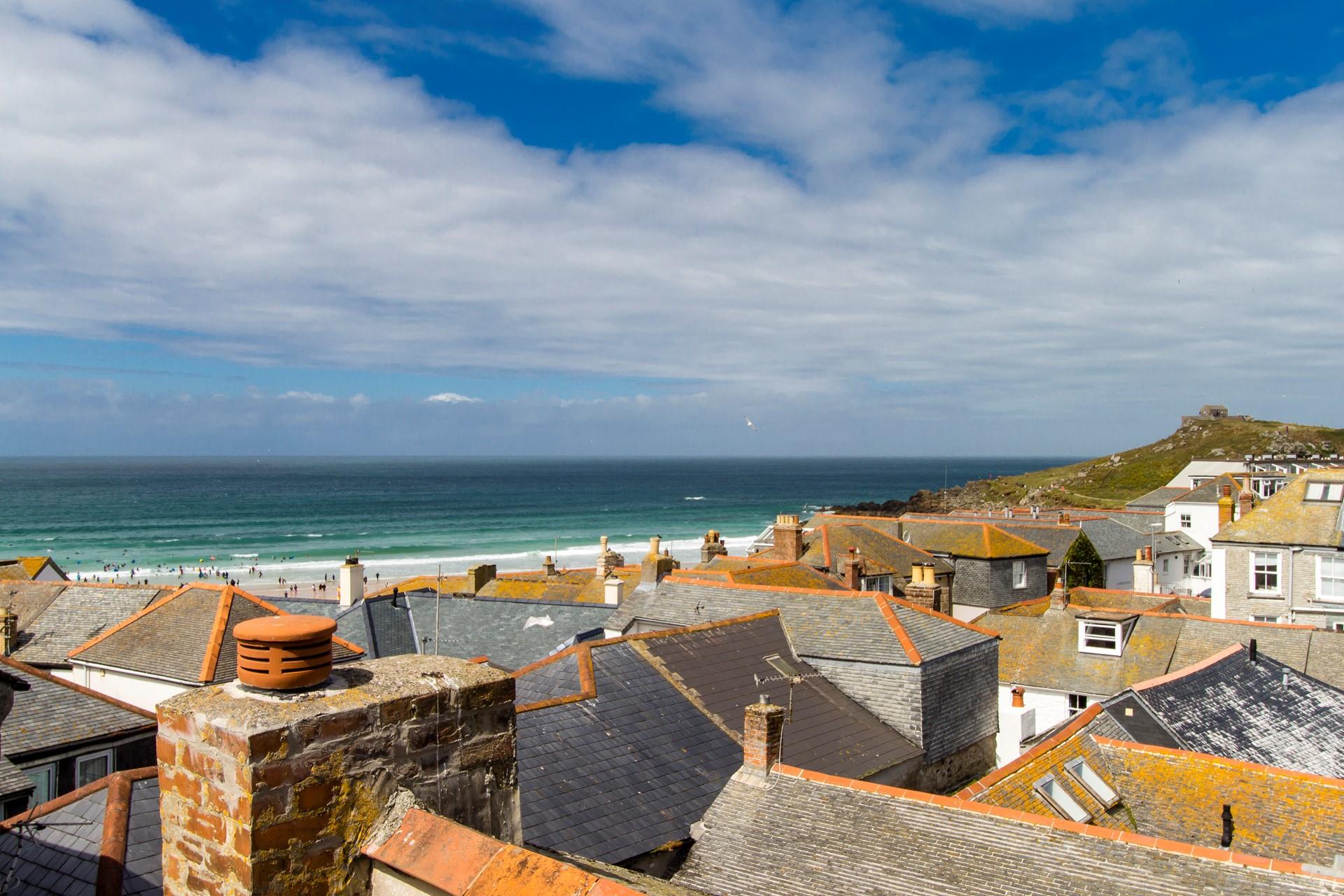 Beautiful views of Porthmeor Beach over the rooftops of St Ives.