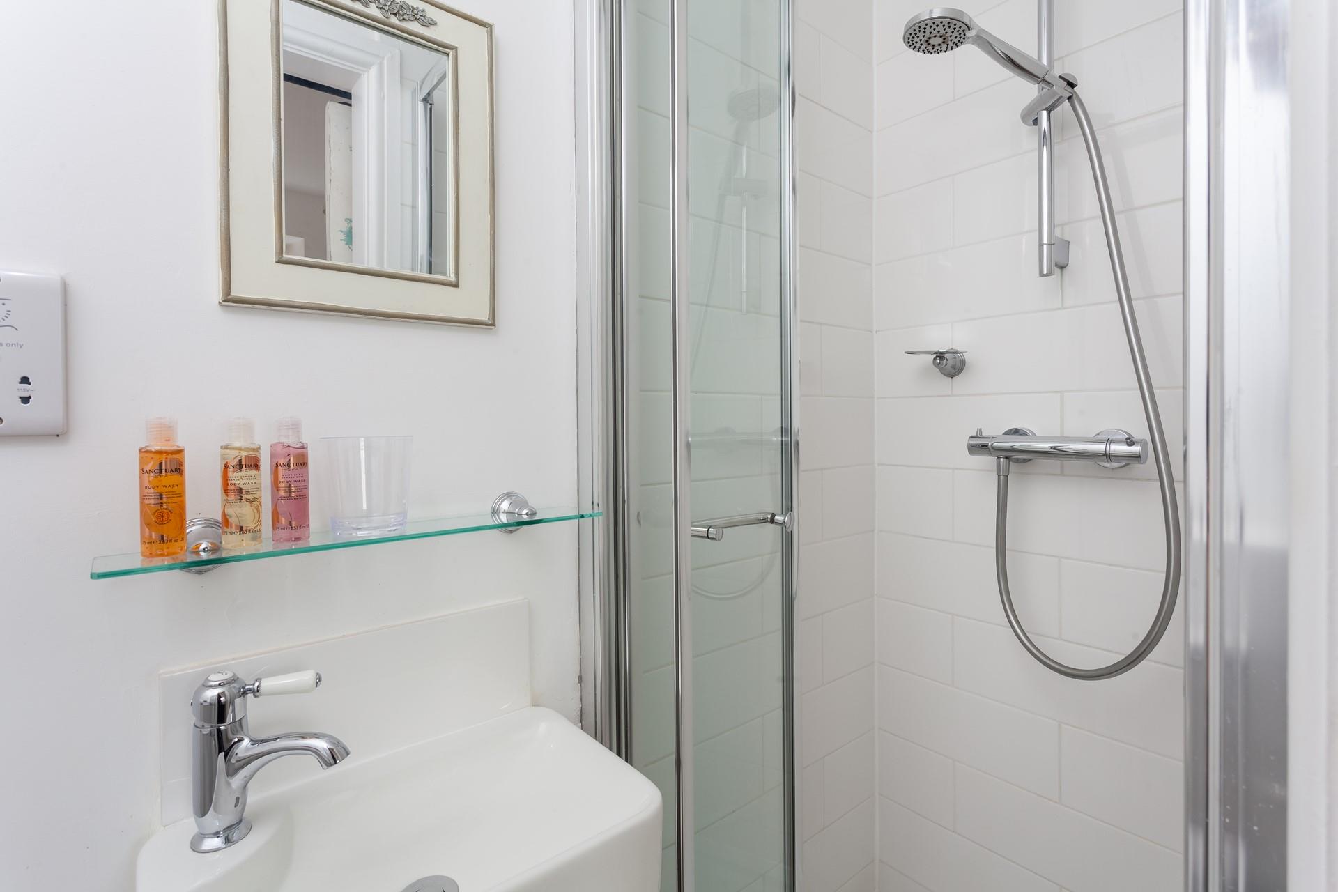 The ensuite is perfect for washing off sandy toes after a day on the beach.