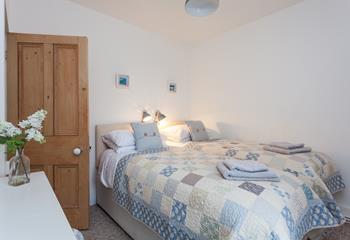 Bedroom 2 has twin beds perfect for young adults or children.