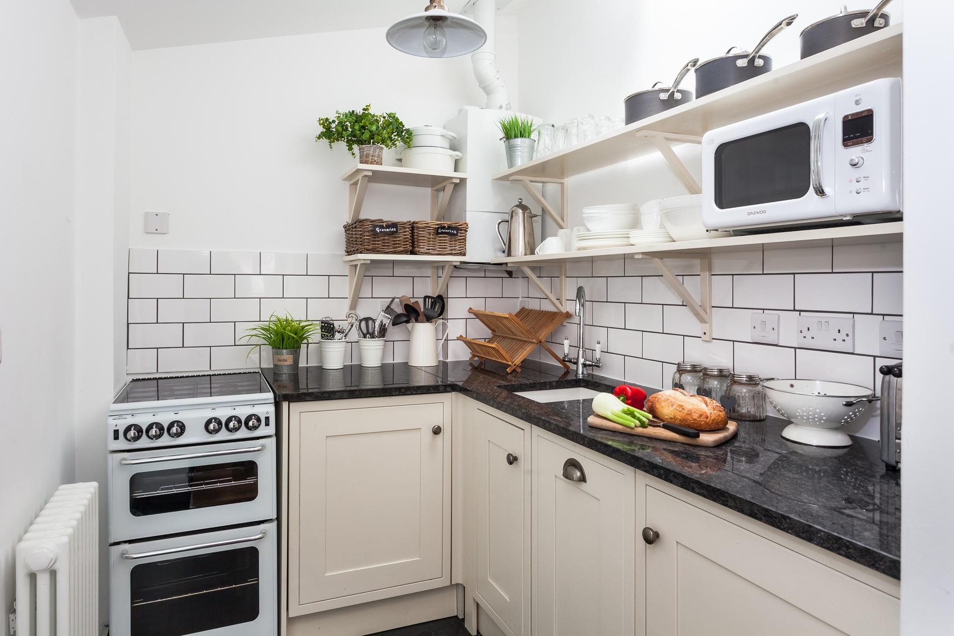 The kitchen is fully equipped for all your cooking needs.