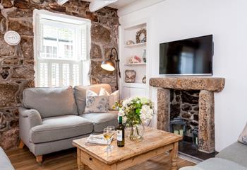 The granite walls and beams are in keeping with the character of this cosy cottage.