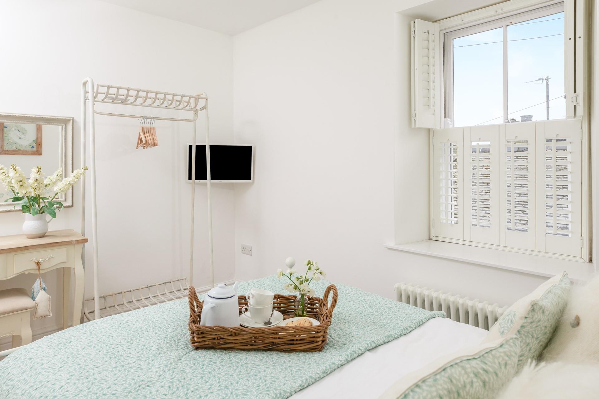 Bedroom 1 has an ensuite shower room for getting ready each morning.