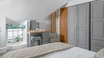 The spacious double bedroom has plenty of storage for your holiday wardrobe!