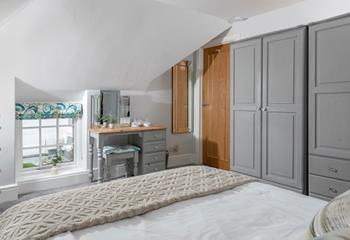 The spacious double bedroom has plenty of storage for your holiday wardrobe!