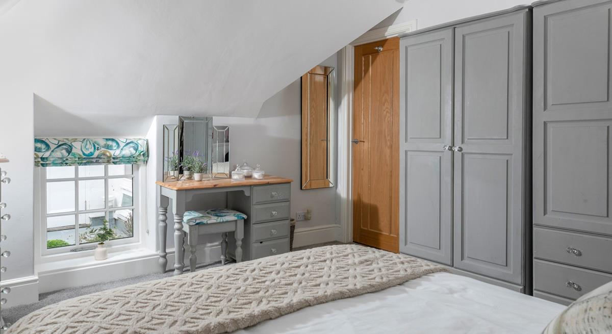 The spacious double bedroom has plenty of storage for your holiday wardrobe!