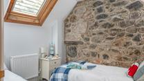 Classic cottage details are blended with modern home comforts.