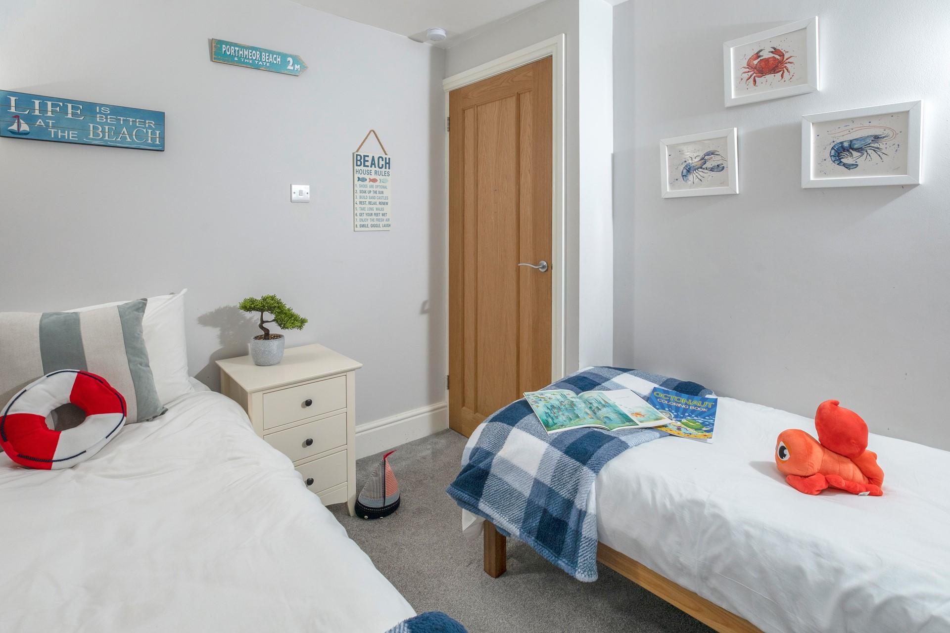 The seaside-themed bedroom is perfect for the little ones.