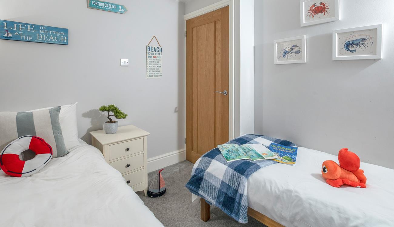 The seaside-themed bedroom is perfect for the little ones.