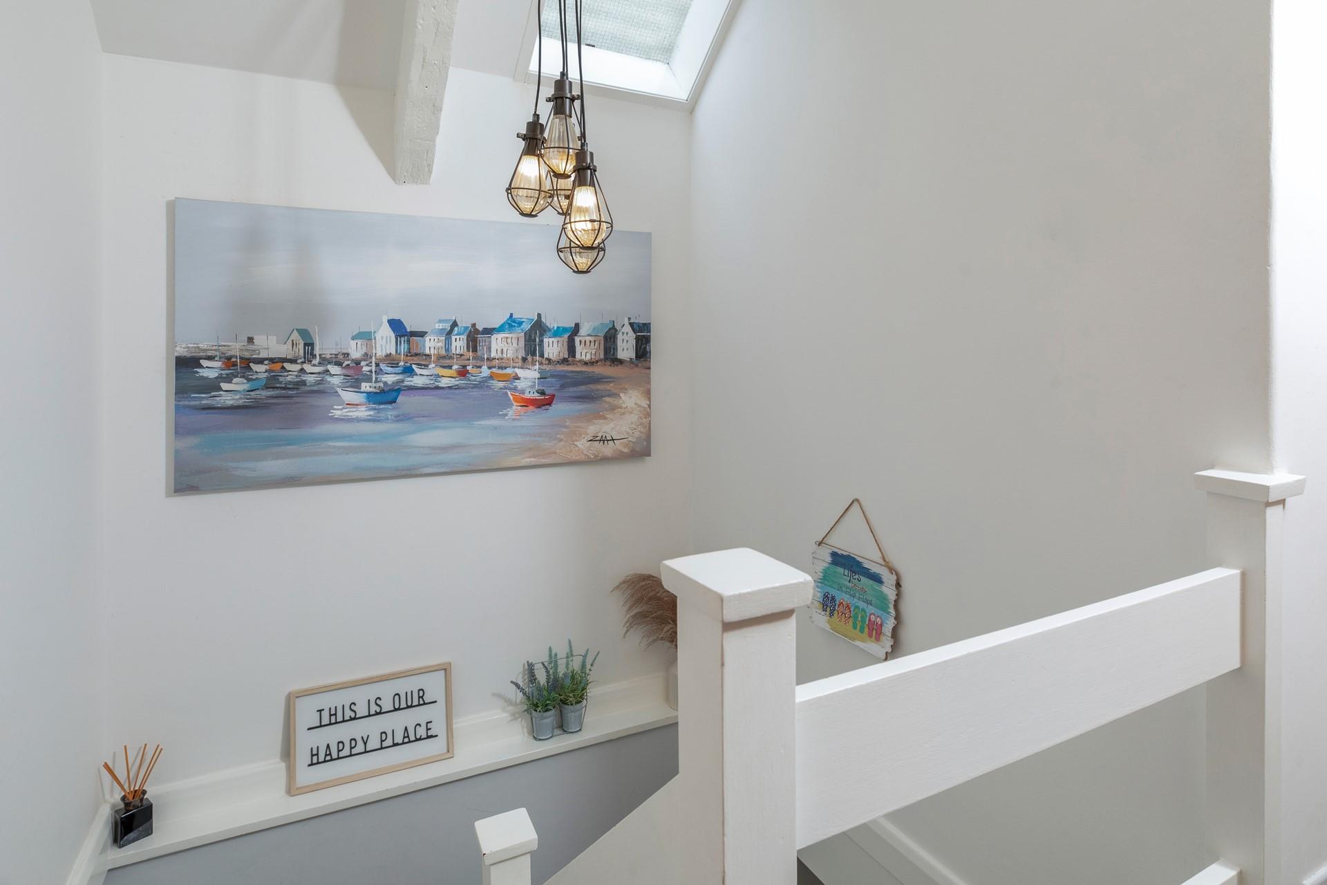 We love the coastal themed interiors dotted around the cottage.