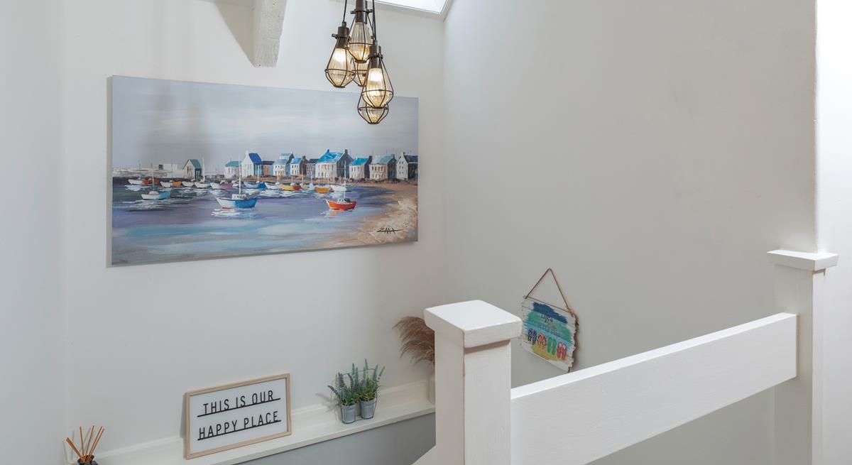 We love the coastal themed interiors dotted around the cottage.