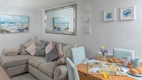 The living area is beautifully decorated with a homely feel.