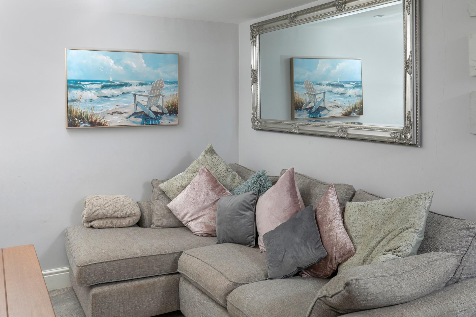 Snuggle up on the comfy corner sofa. 