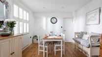 Light and bright, the dining area is a great space to enjoy a hearty breakfast before heading out for the day.