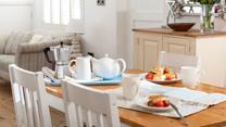 Tuck into a Cornish cream tea after a morning walk through town.