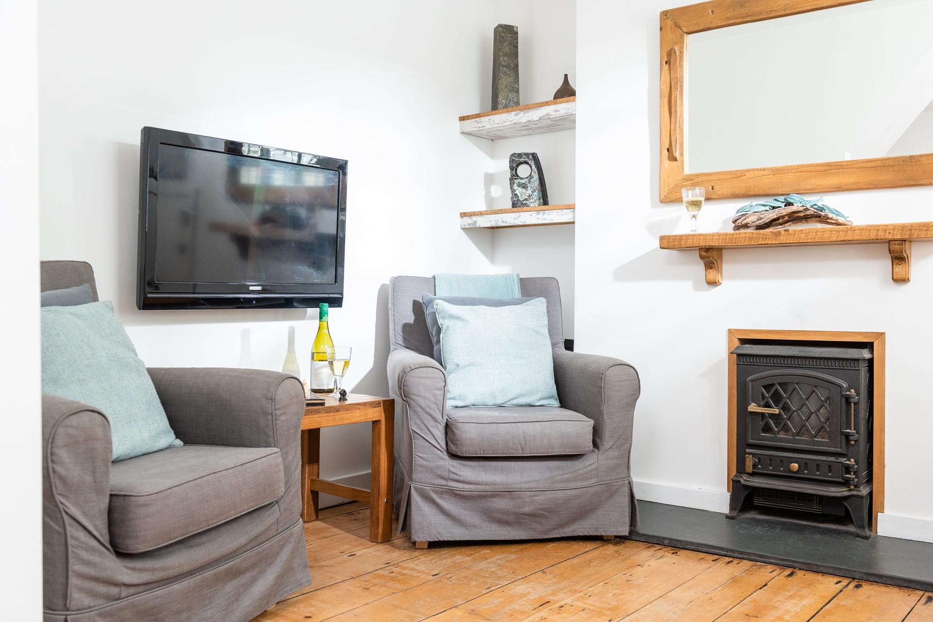 Turn on the electric effect fire and snuggle up for a cosy evening.