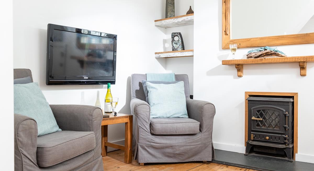 Turn on the electric effect fire and snuggle up for a cosy evening.