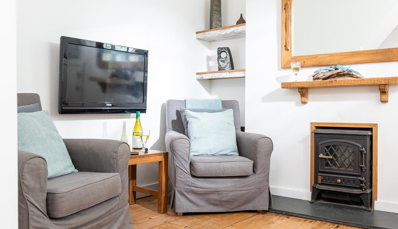 Turn on the electric effect fire and snuggle up for a cosy evening.