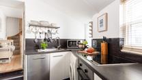 Cook up a storm for the whole family in the well-equipped kitchen.