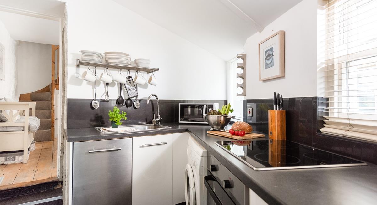 Cook up a storm for the whole family in the well-equipped kitchen.