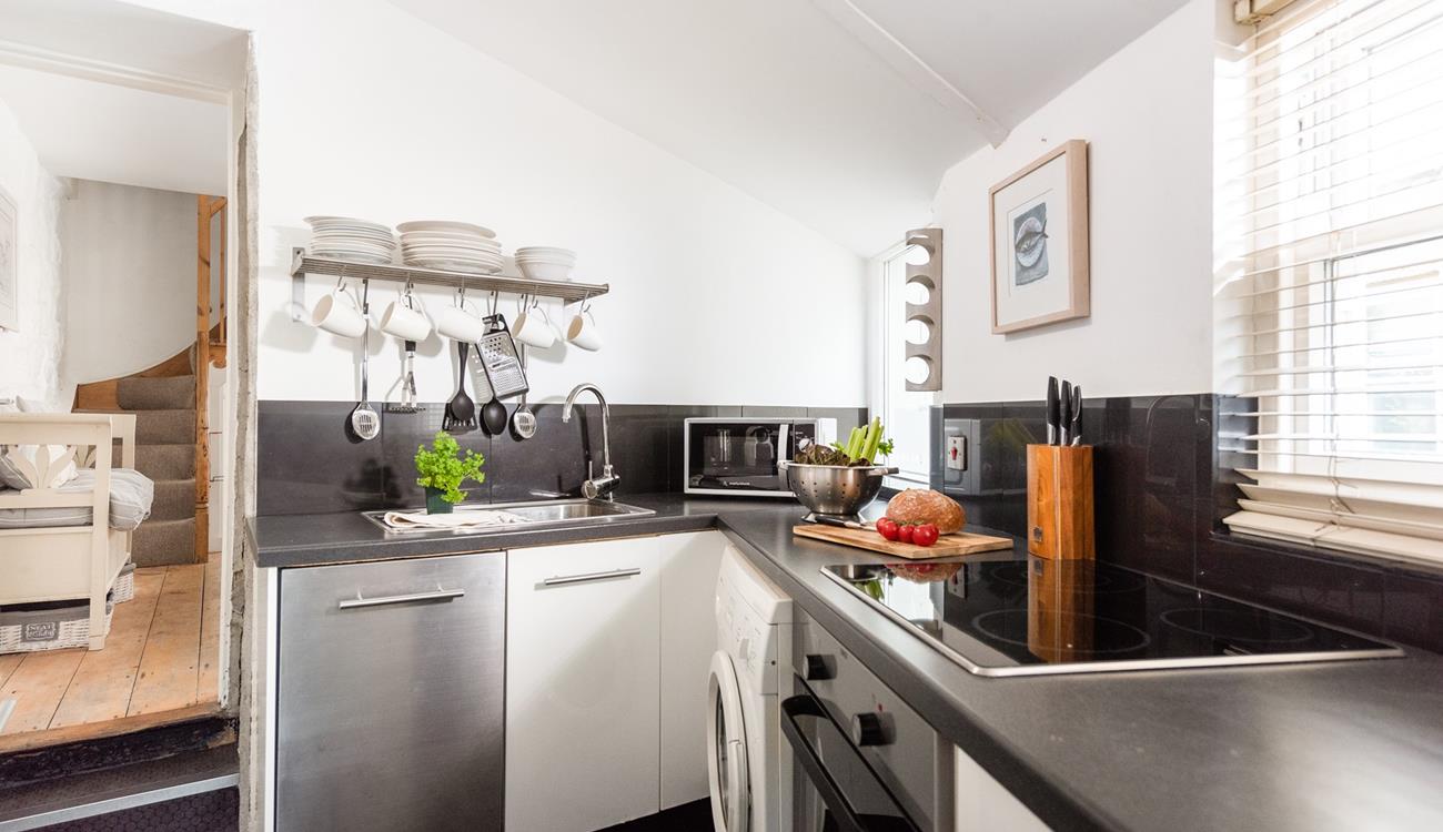 Cook up a storm for the whole family in the well-equipped kitchen.