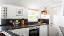 Kitchen is equipped with everything you will need to enjoy your holiday, including a washing machine, dishwasher and a Nespresso coffee machine.