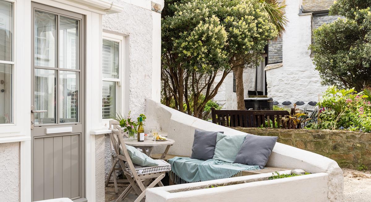 The little private courtyard outside the property is the perfect spot to sip your morning cuppa in the sunshine.