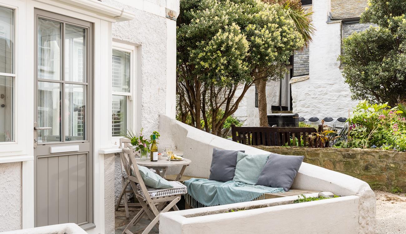 The little private courtyard outside the property is the perfect spot to sip your morning cuppa in the sunshine.